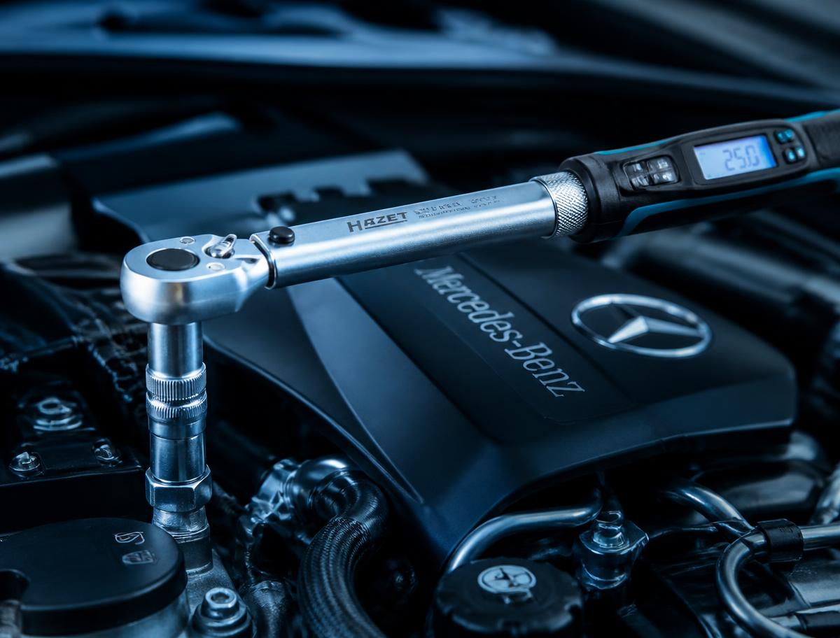 Torque wrench on a Mercedes-Benz engine cover